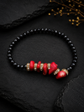 Ognisty Amulet – bransoletka z koralu i czarnego turmalinu